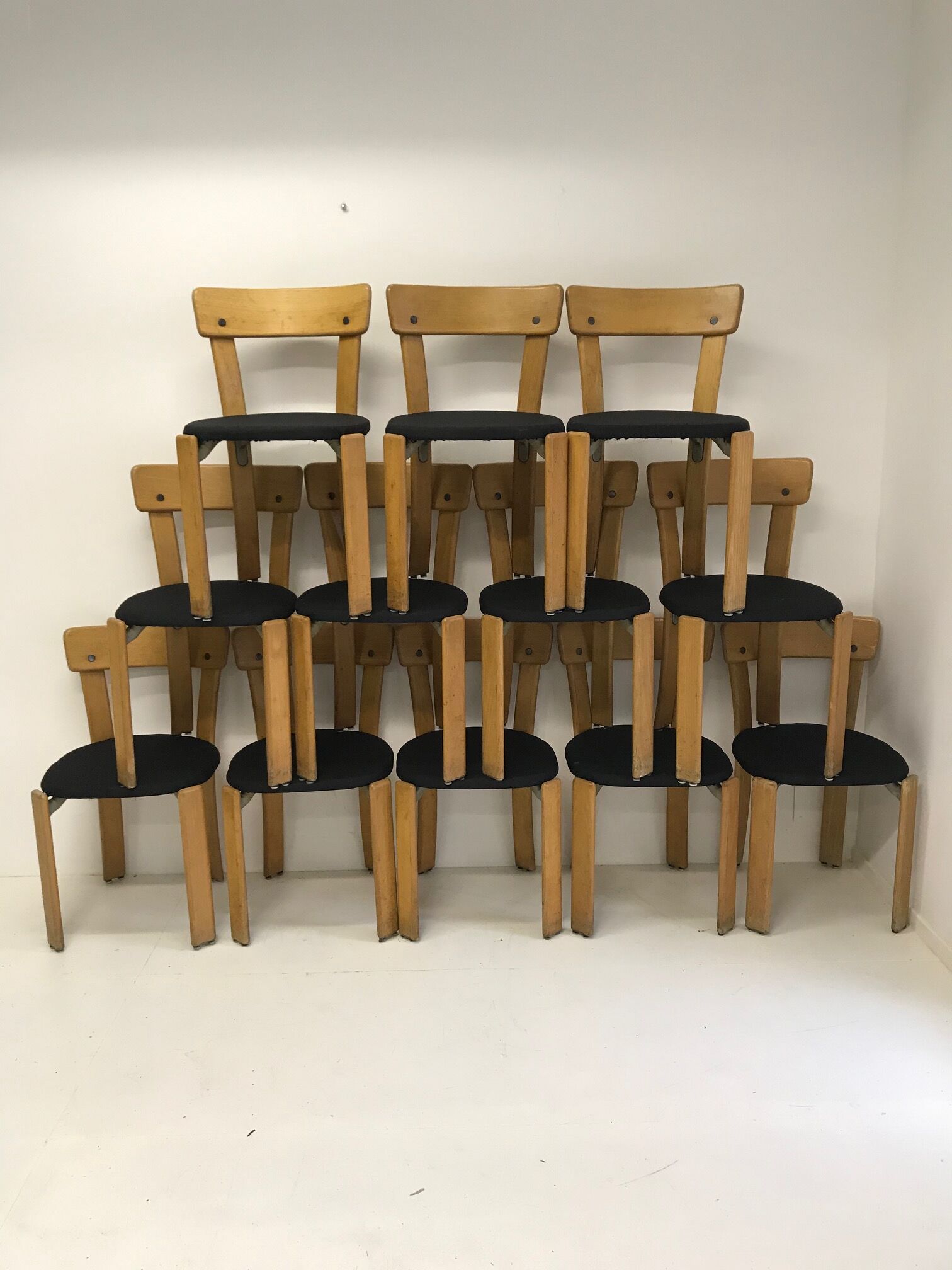 Designer Bruno Rey's suite of 12 chairs