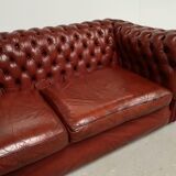 Old red leather Chesterfield sofa