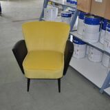 Pair of vintage 1950s cocktail chairs in yellow velvet and black faux leather, wooden frame.