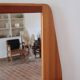 Wall mirror with a solid pine frame, integrated shelf.