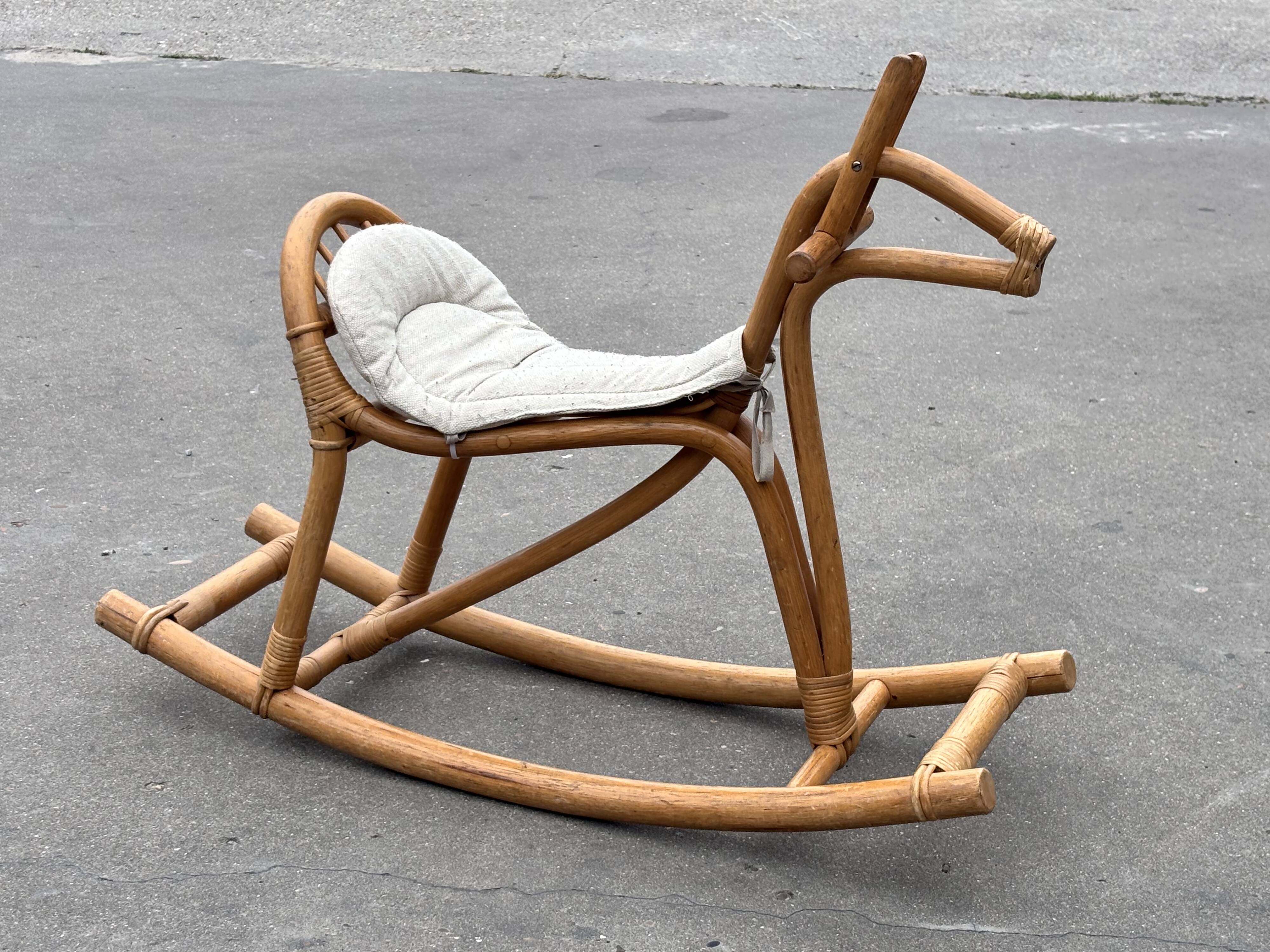 Vintage rattan rocking horse for a 1960s nursery design