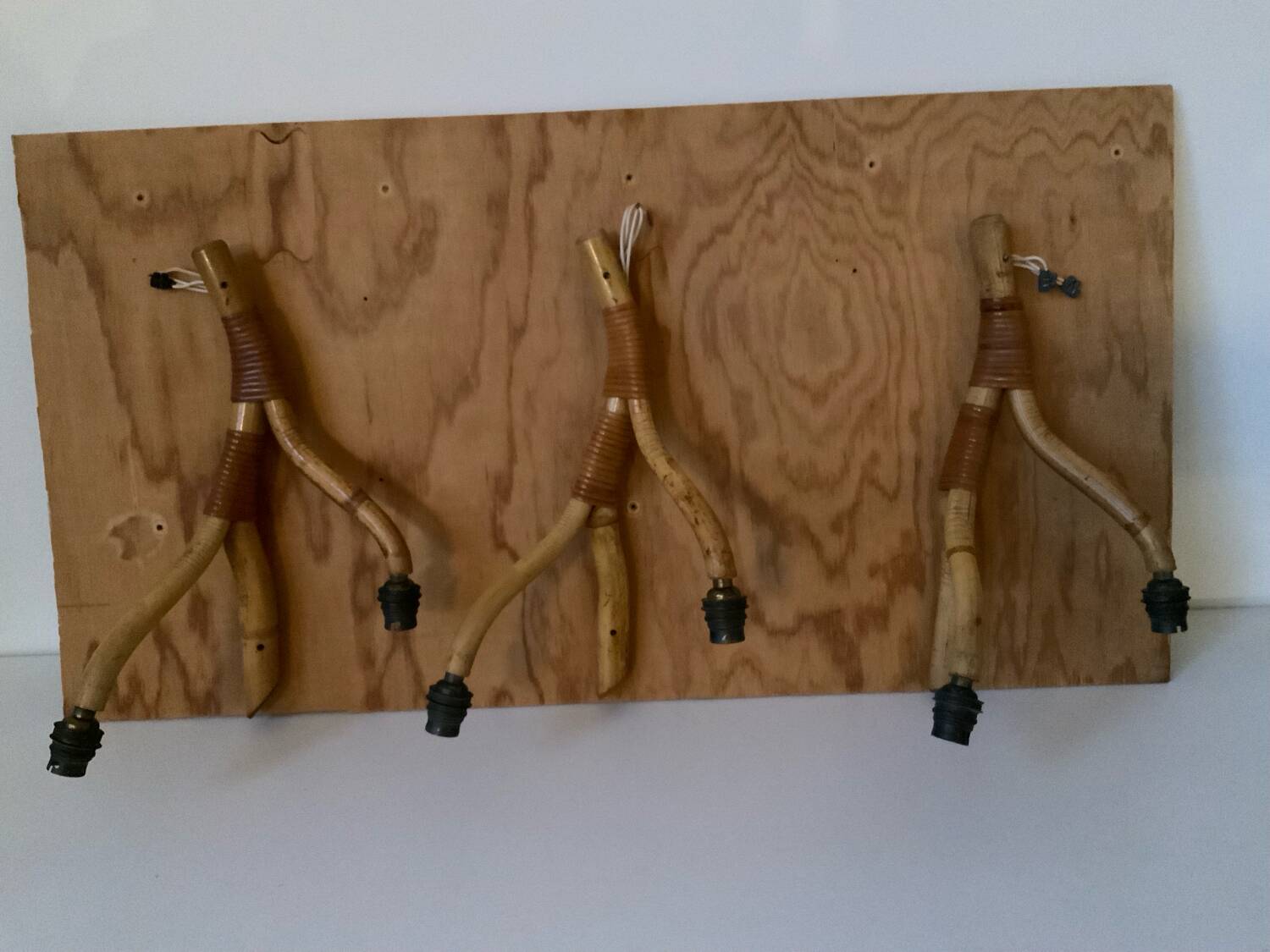 Rattan wall light trio