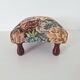 Repose-pieds en tapisserie florale