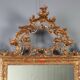Antique carved and gilded wooden mirror, Italy, early 20th century.