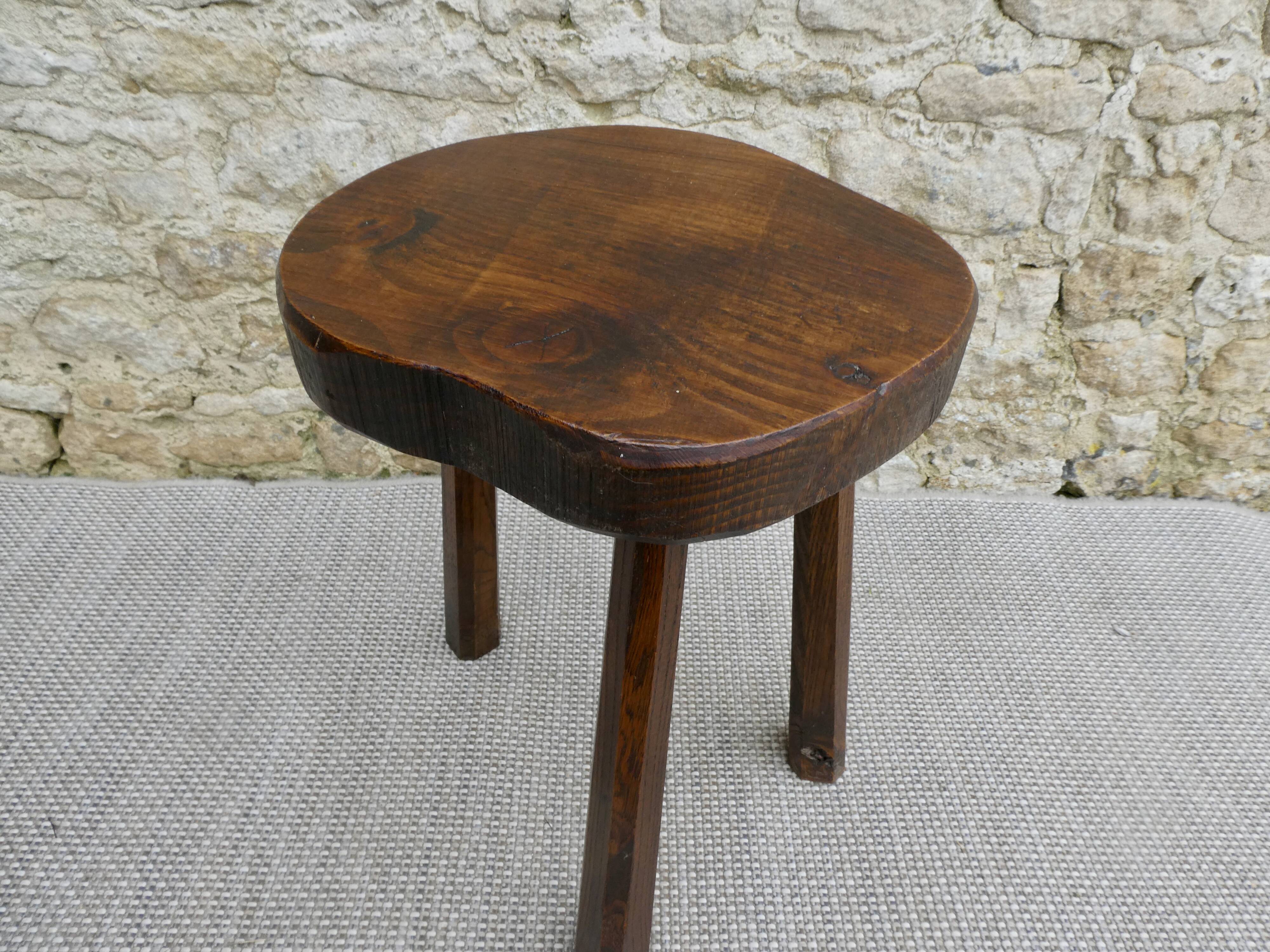 Tripod stool in raw wood