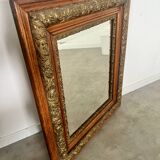 Old mirror in oak and gilded wood early 20th century beveled glass