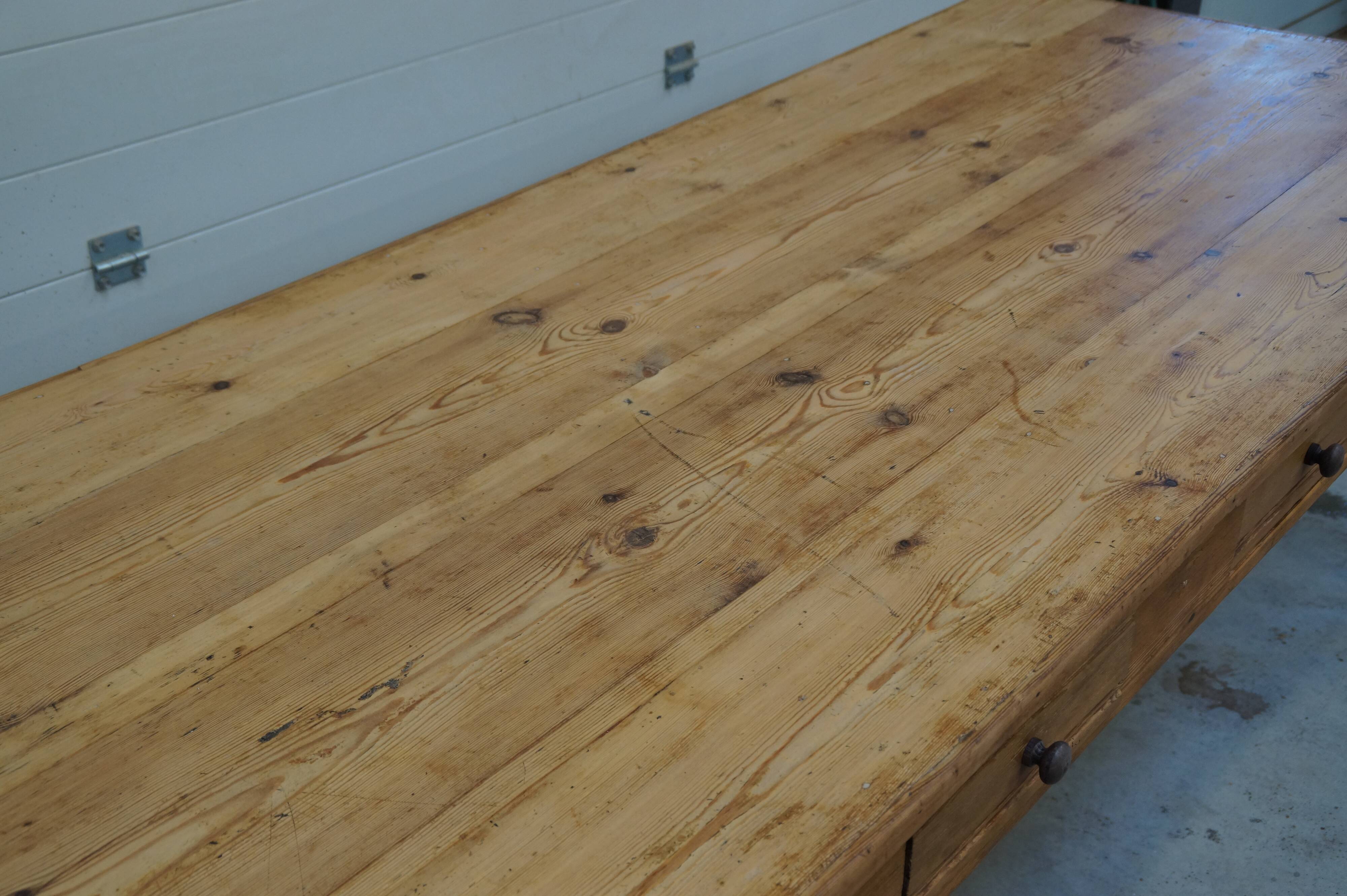 Old canteen in pine table