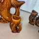 Vintage "Famille Carpe" liqueur set in amber ceramic – 7 pieces