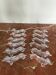 Series of 12 dachshund knife holders