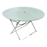 Old round folding metal table