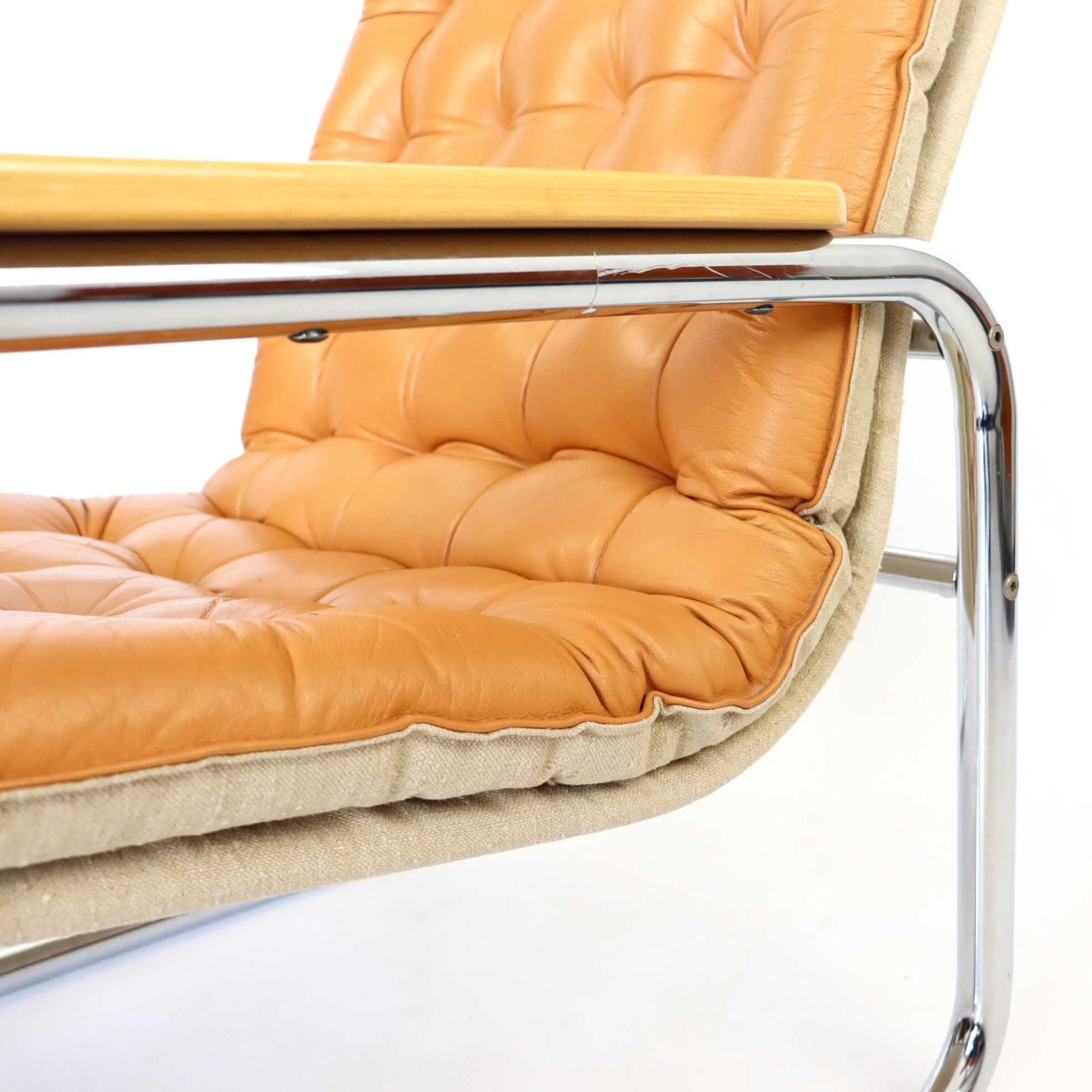 Leather and chrome armchair 70s
