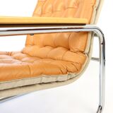 Leather and chrome armchair 70s