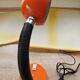 Vintage orange pop desk lamp with a flexible gooseneck - 1970s