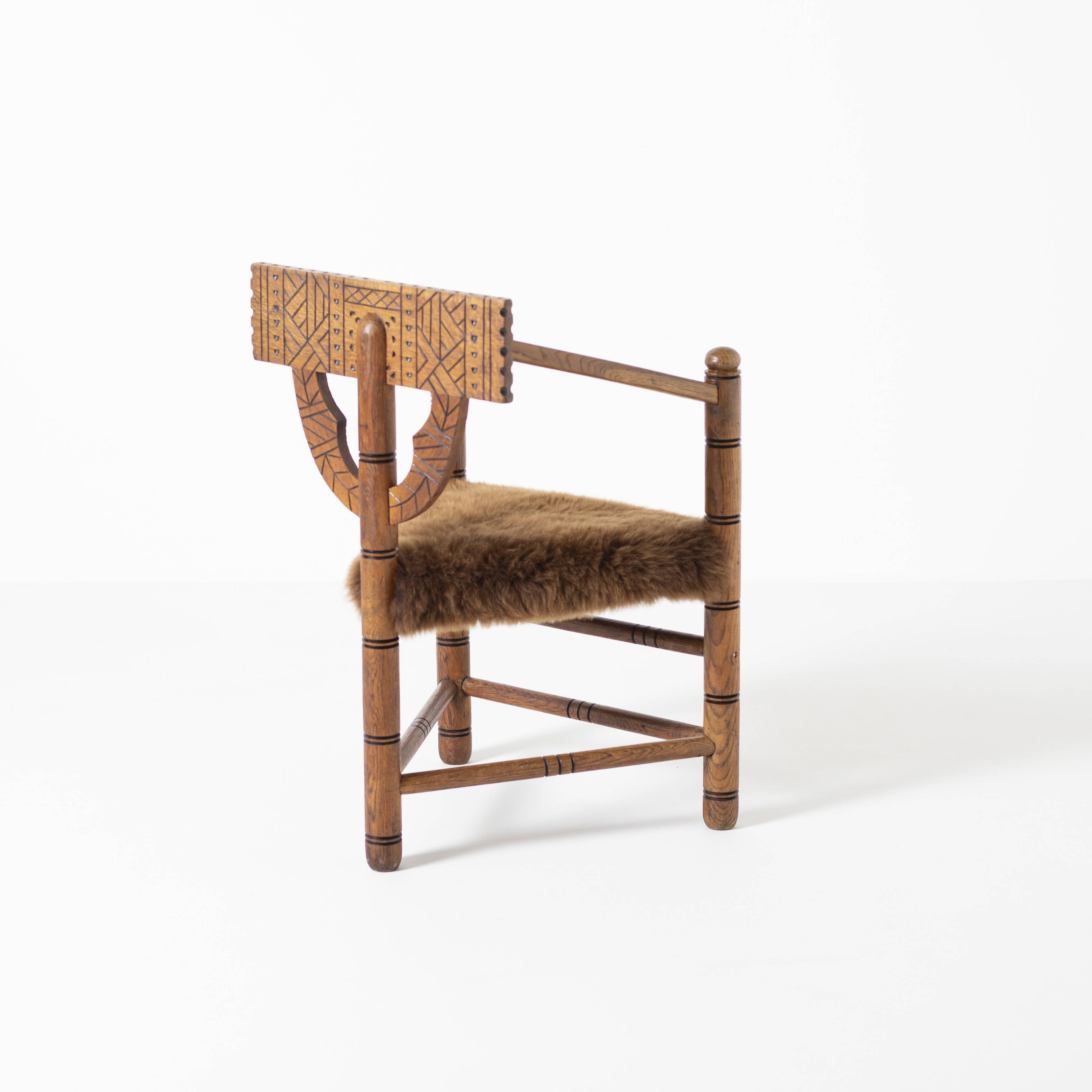 Hand carved brutalist  / folk 'Monk' chair, reupholstered in sheepskin, Swe