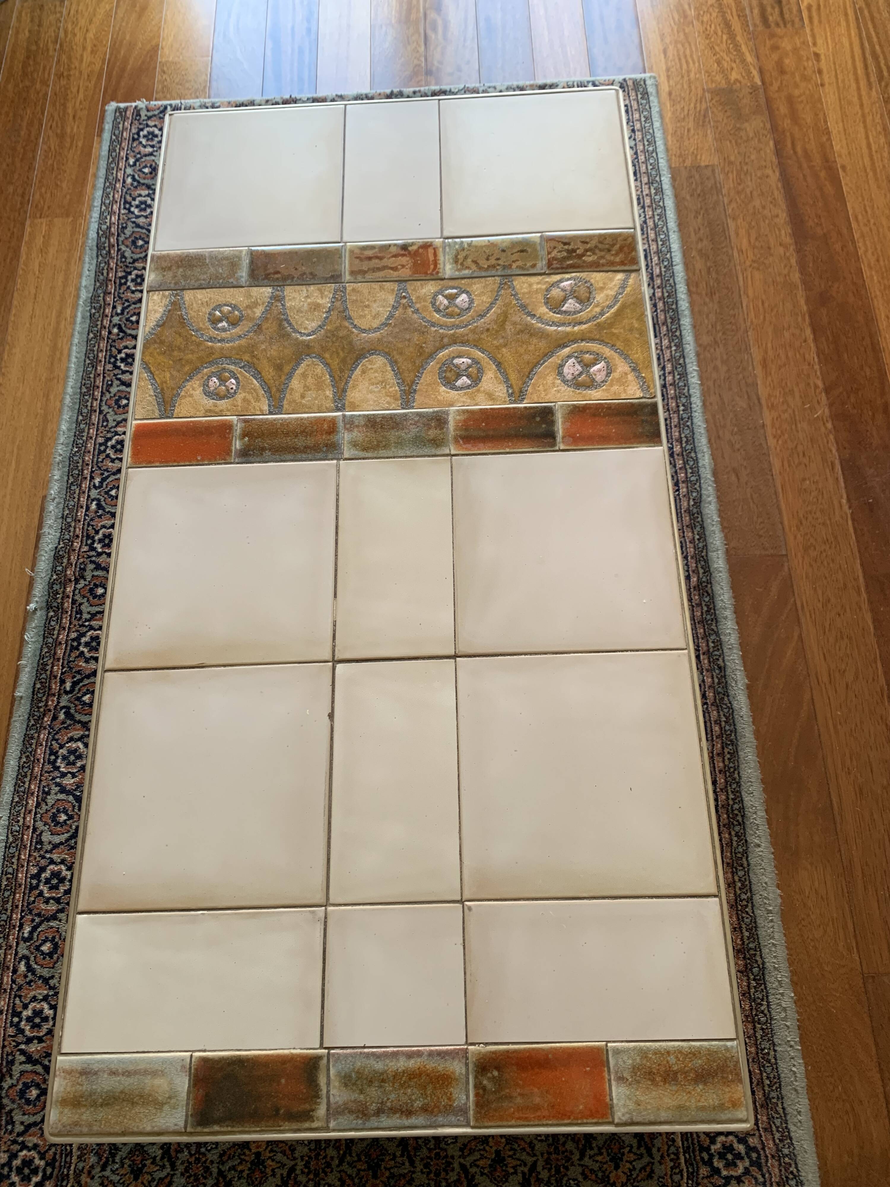 Coffee table in steel and ceramic tiles Roche Bobois