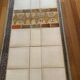 Coffee table in steel and ceramic tiles Roche Bobois