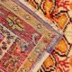 Handwoven orange wool area rug 85x155cm