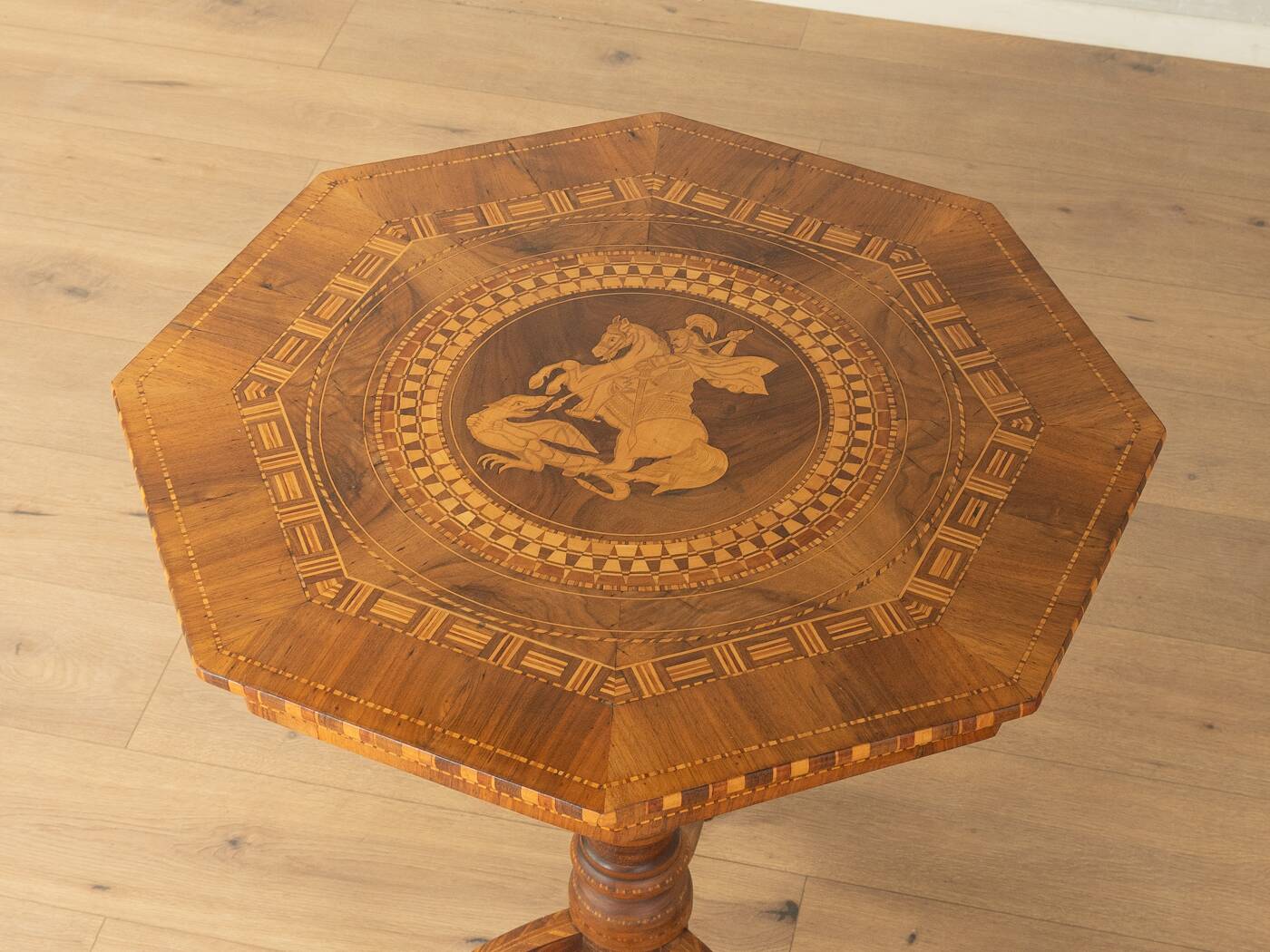 Antique octagonal walnut side table with elaborate inlays, probably Italy, mid-19th century