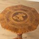 Antique octagonal walnut side table with elaborate inlays, probably Italy, mid-19th century