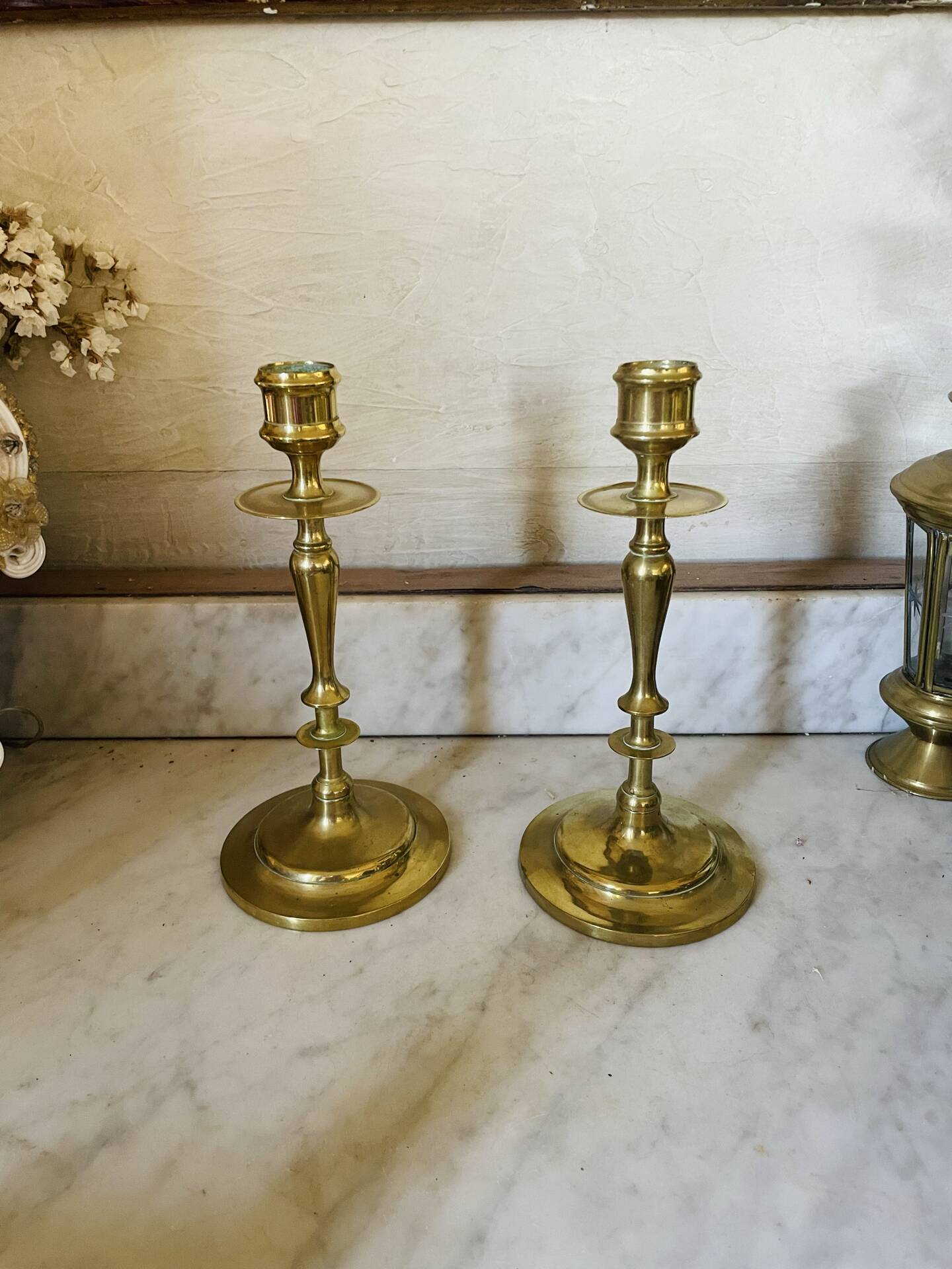 Old pair of turned brass candlesticks