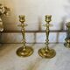 Old pair of turned brass candlesticks
