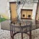 Wood table bamboo style smoked glass 70s