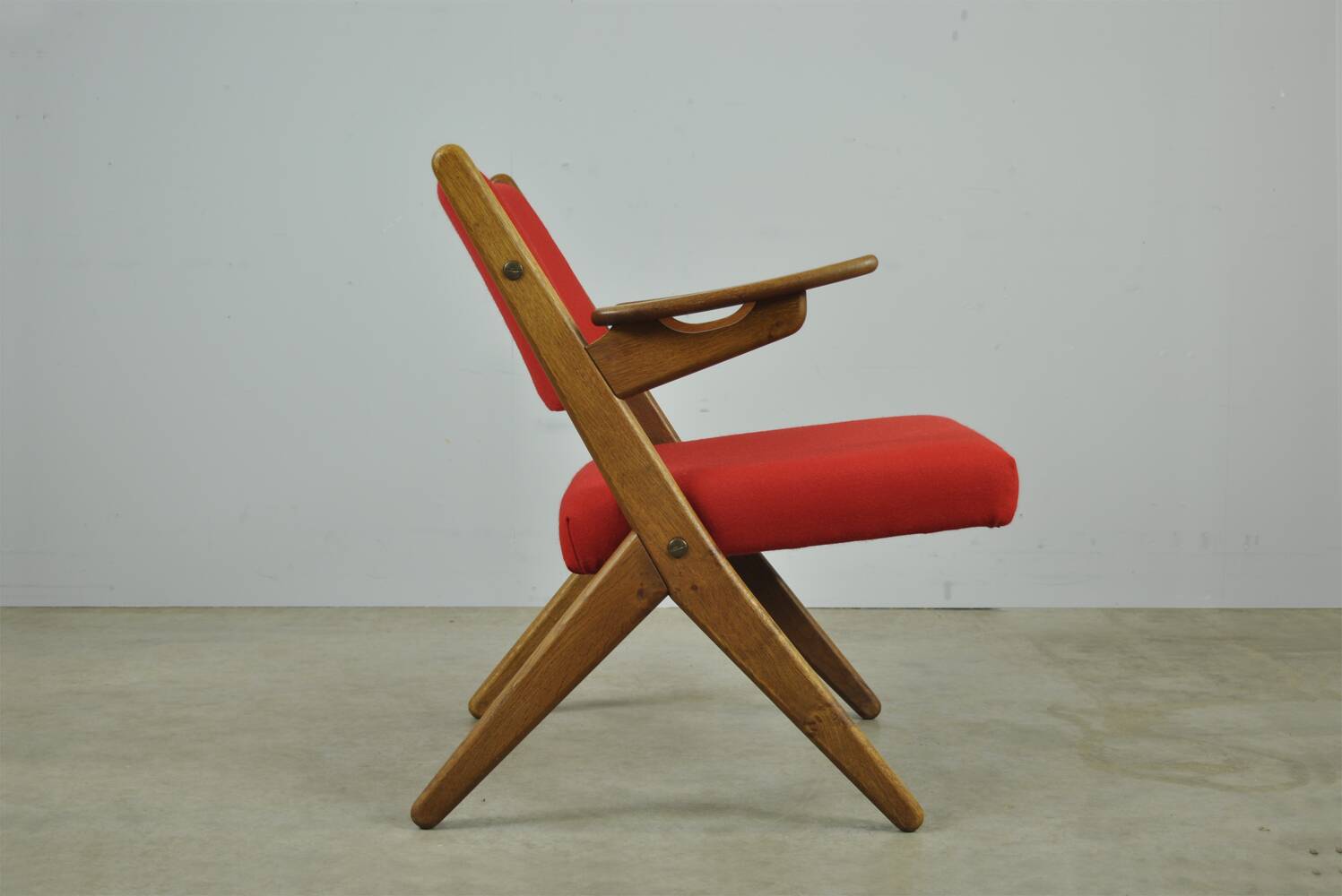 Classic Danish vintage scissor armchair by Arne Hovmand Olsen in OAK, 1960s