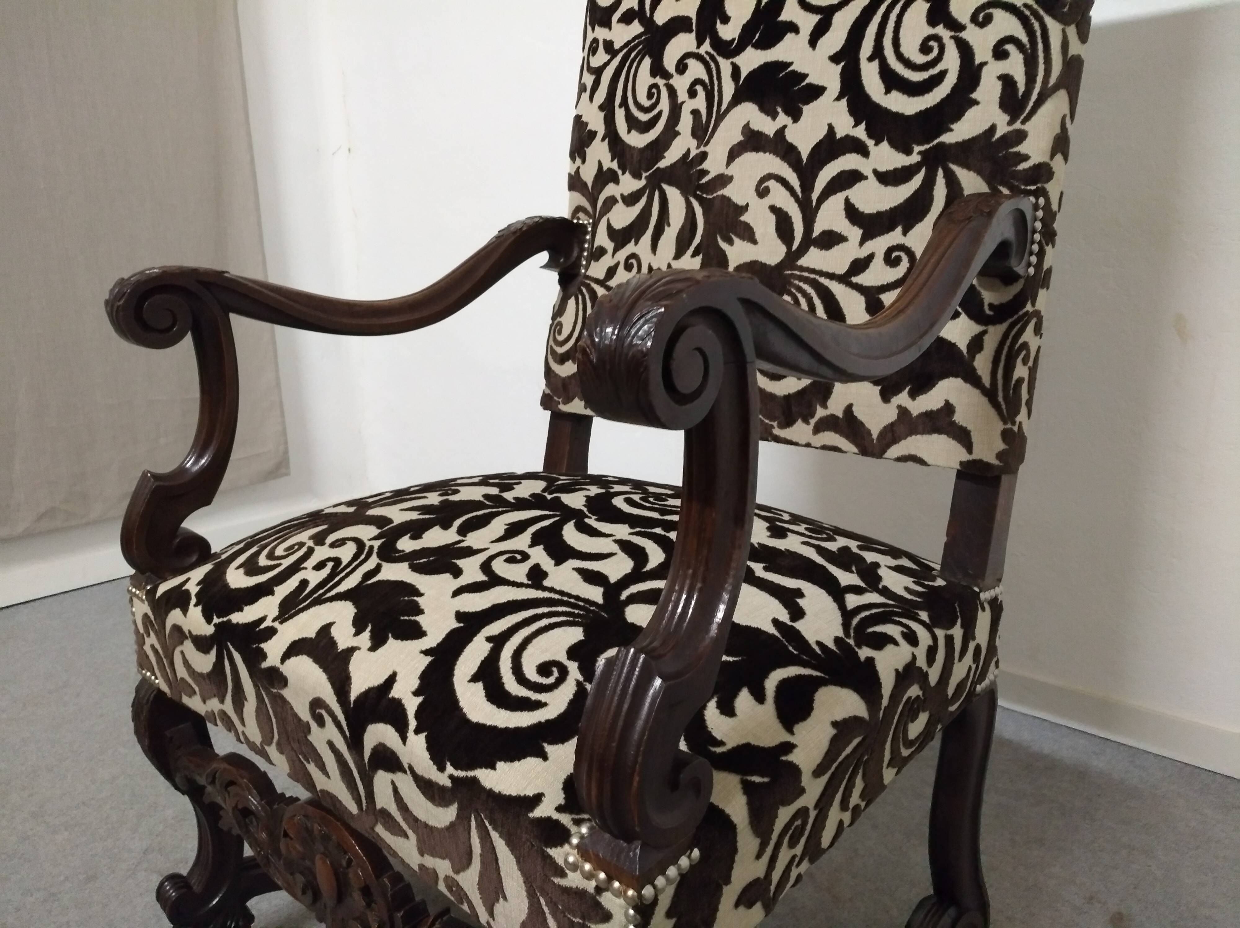 Pair of ceremonial armchairs in blackened oak, France late 18th century.
