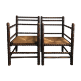 Pair of old wooden armchairs turned
