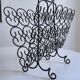 Wrought iron magazine rack 1960