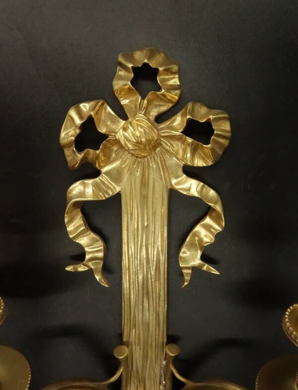 Large pair of wall sconces, bows & hunting horns, Louis XVI style - bronze