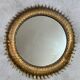 Round sun mirror in wrought iron from the 1950s Italy.