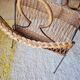 Vintage wicker and metal magazine rack
