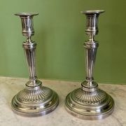 Pair of silvered bronze candlesticks in the Louis XVI style signed Voisenet, 19th century.