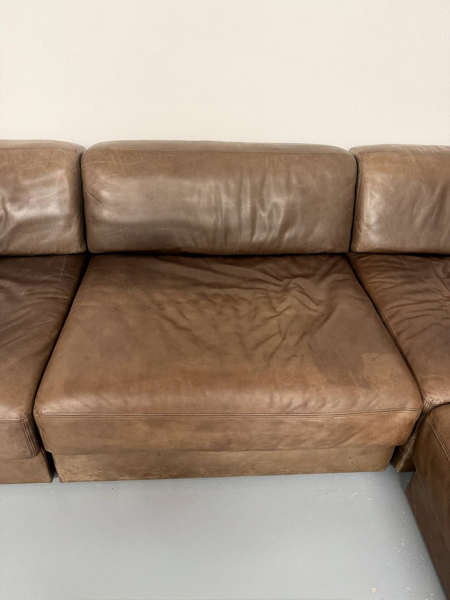 Modular corner sofa DS-76 in brown leather, designed by De Sede, 1980s.