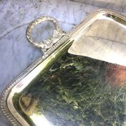 Silver-plated service tray in the Louis XVI style.