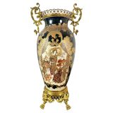 Satsuma porcelain vase from Japan and XIXth century gilded metal