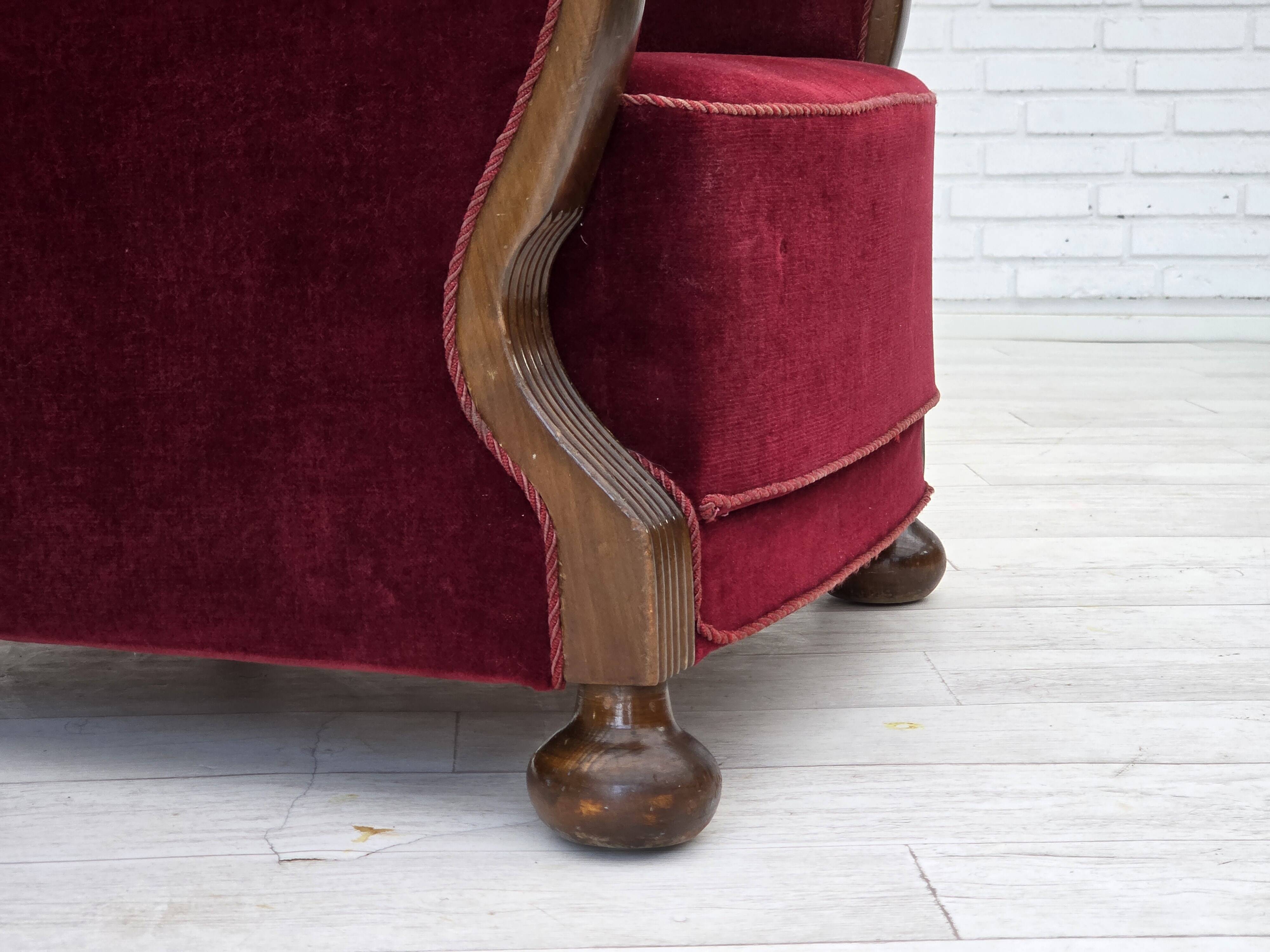 1950s, Danish relax armchair, cherry-red furniture velour, dark beech wood.