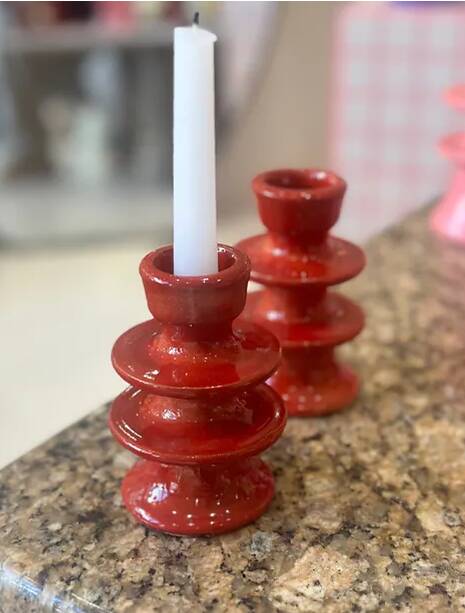 Red candlestick holder