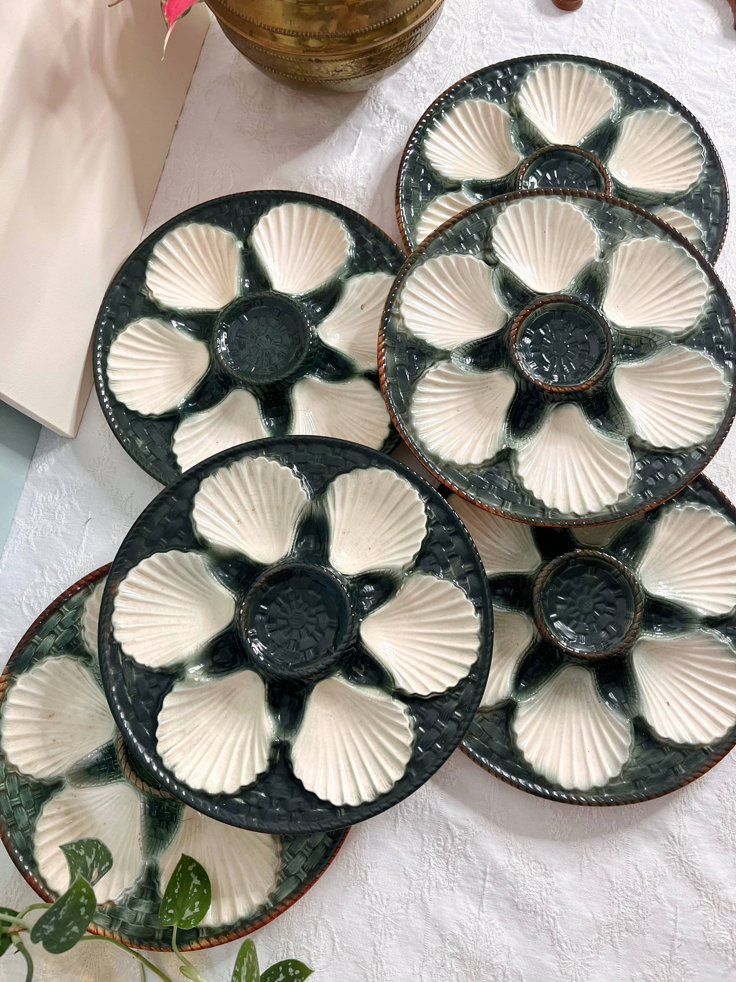 Green and white slip oyster plates