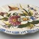 Earthenware wall plate signed bassano, italy, polychrome floral painting decoration