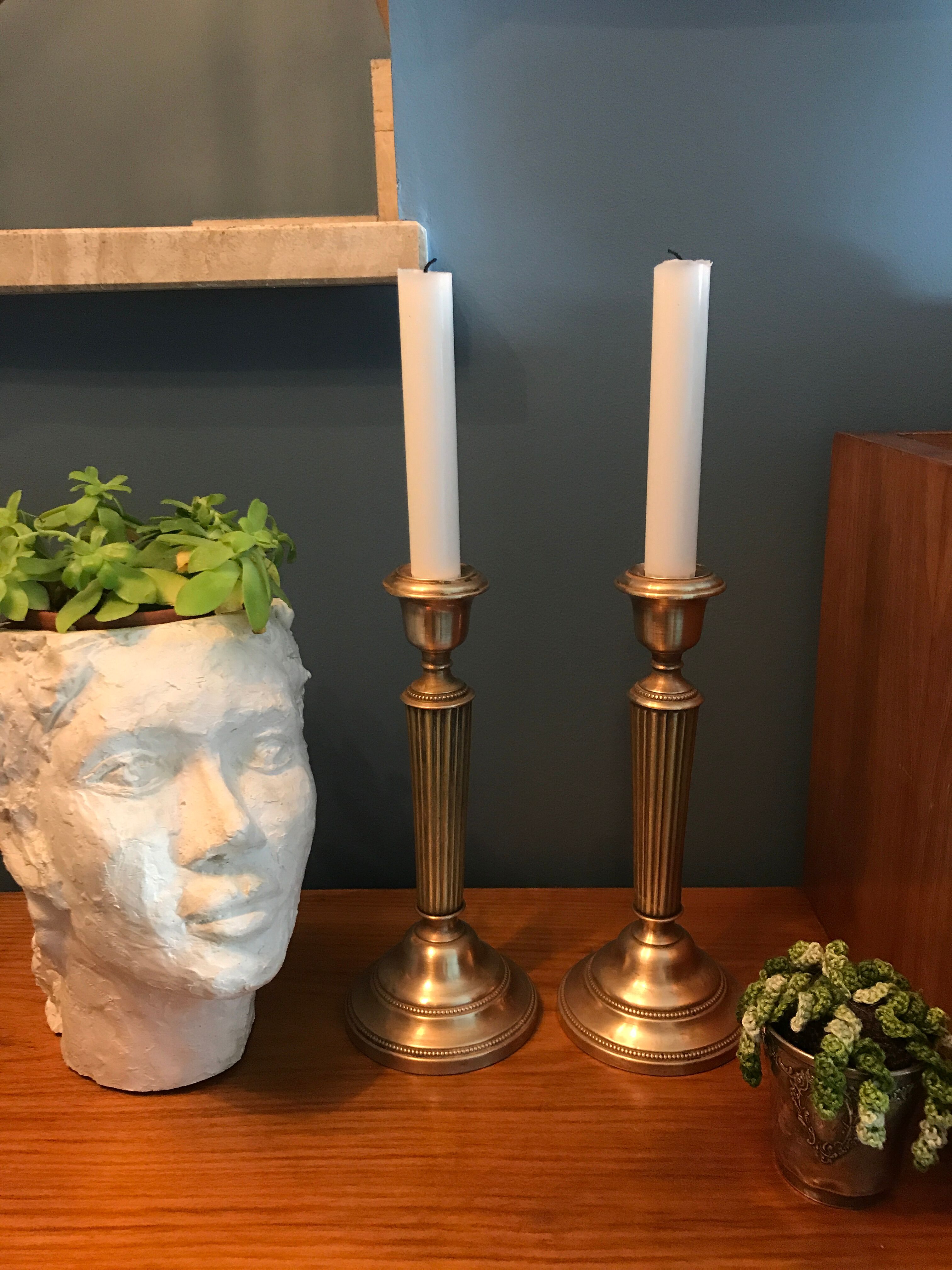 Pair of old brass candlesticks