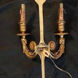 Paire d'appliques en bronze doré style empire.