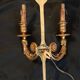 Paire d'appliques en bronze doré style empire.