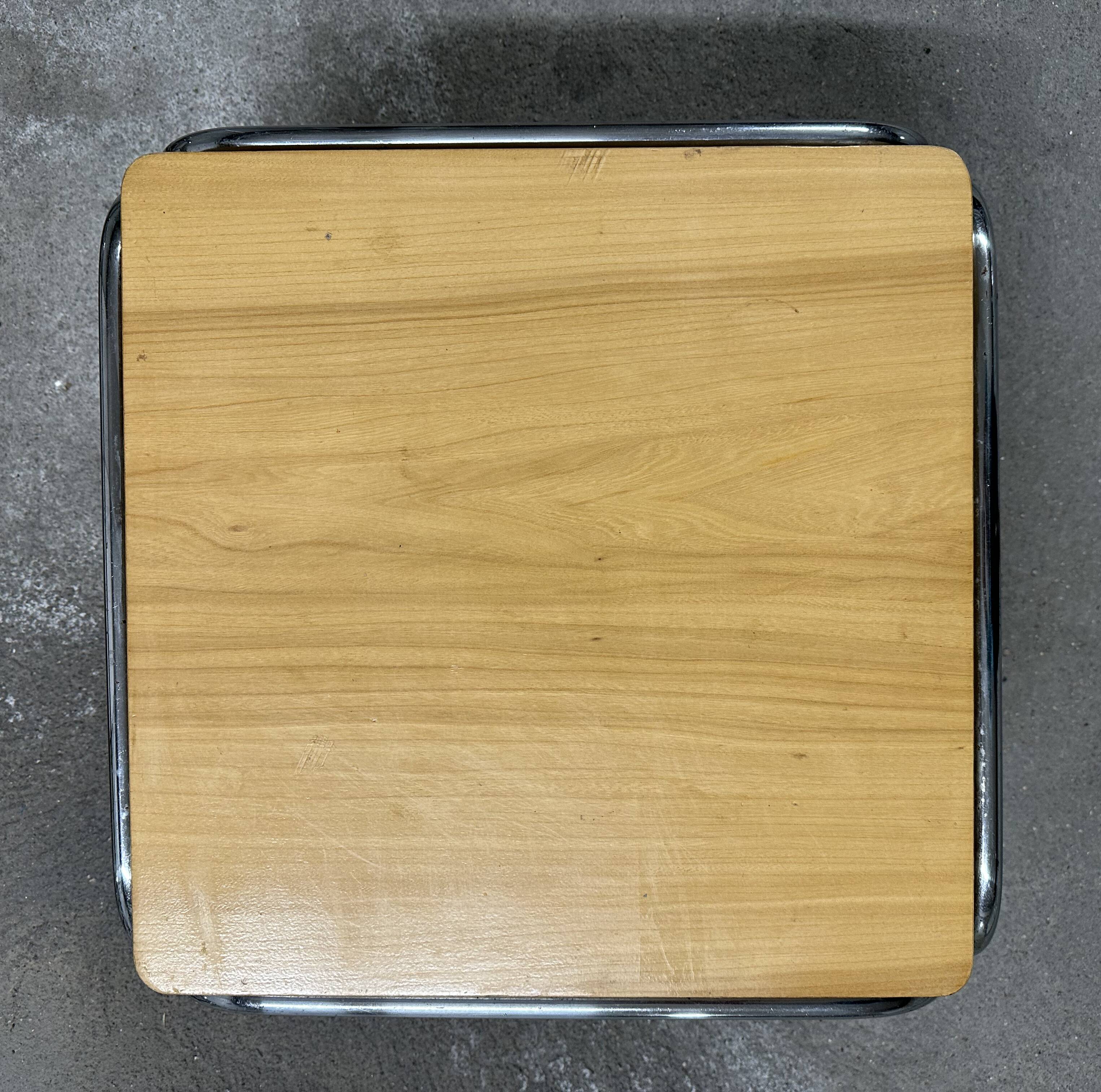 Set of 4 nesting coffee tables from the 70s, metal and solid oak.