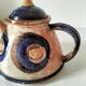 Red earthenware teapot