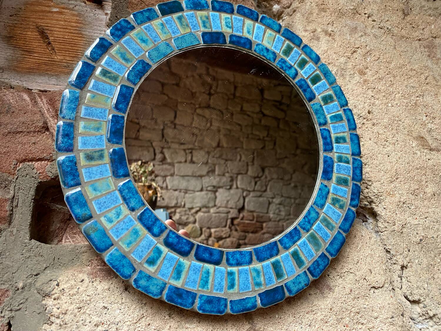 Round ceramic mirror with blue mosaic decor circa 1960