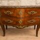 Commode sauteuse galbée de style Louis XV en marqueterie et bronzes dorés (