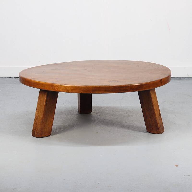 Large vintage round coffee table in raw oak brutalism.