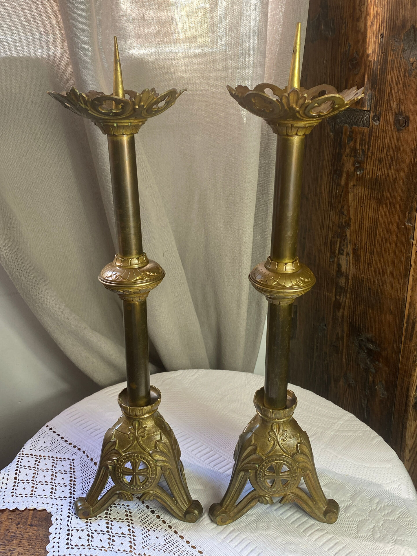 Pair of candlesticks in bronze and brass